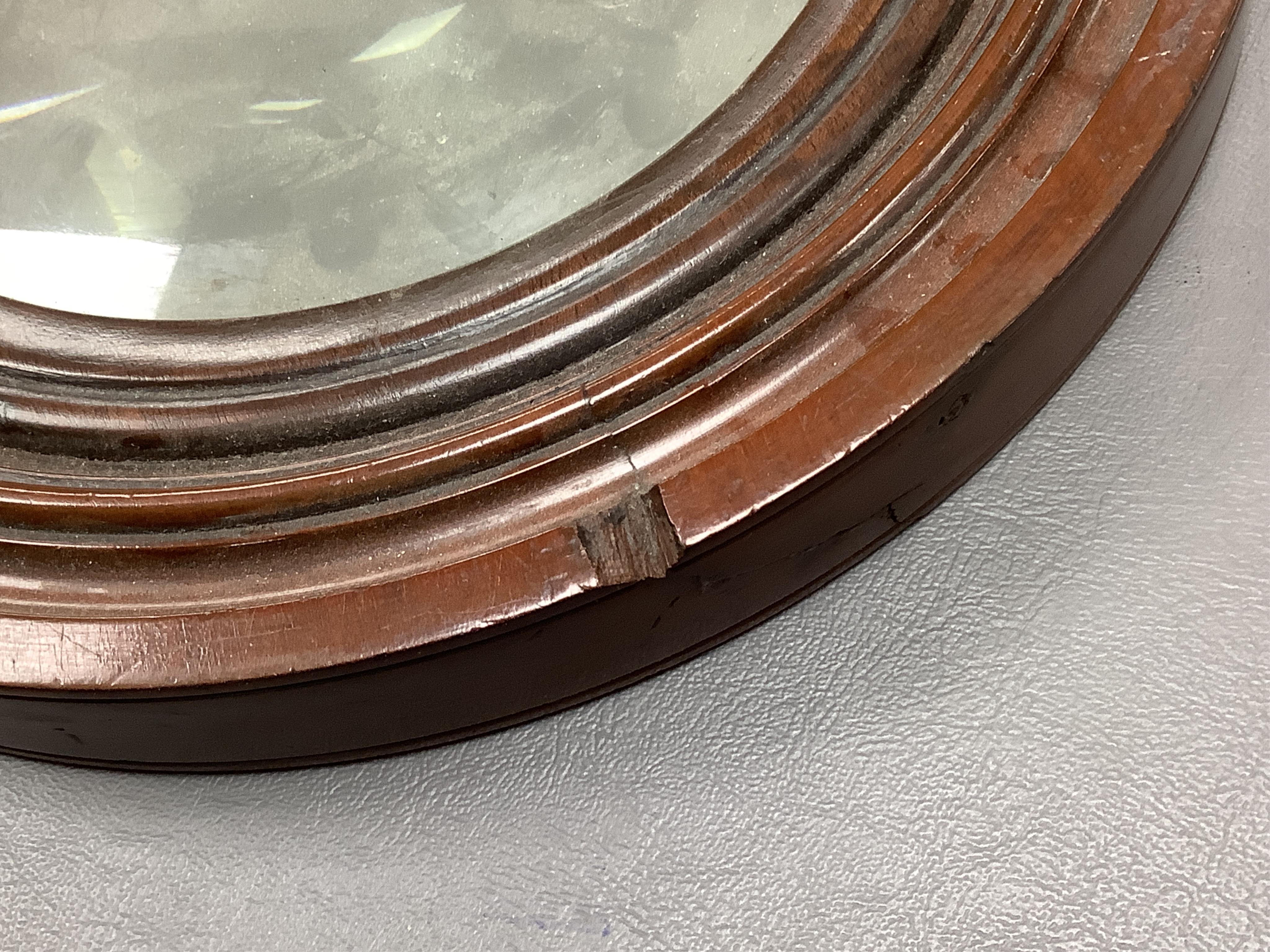 A large oversized 19th century fruitwood magnifying glass, 50cm in length
